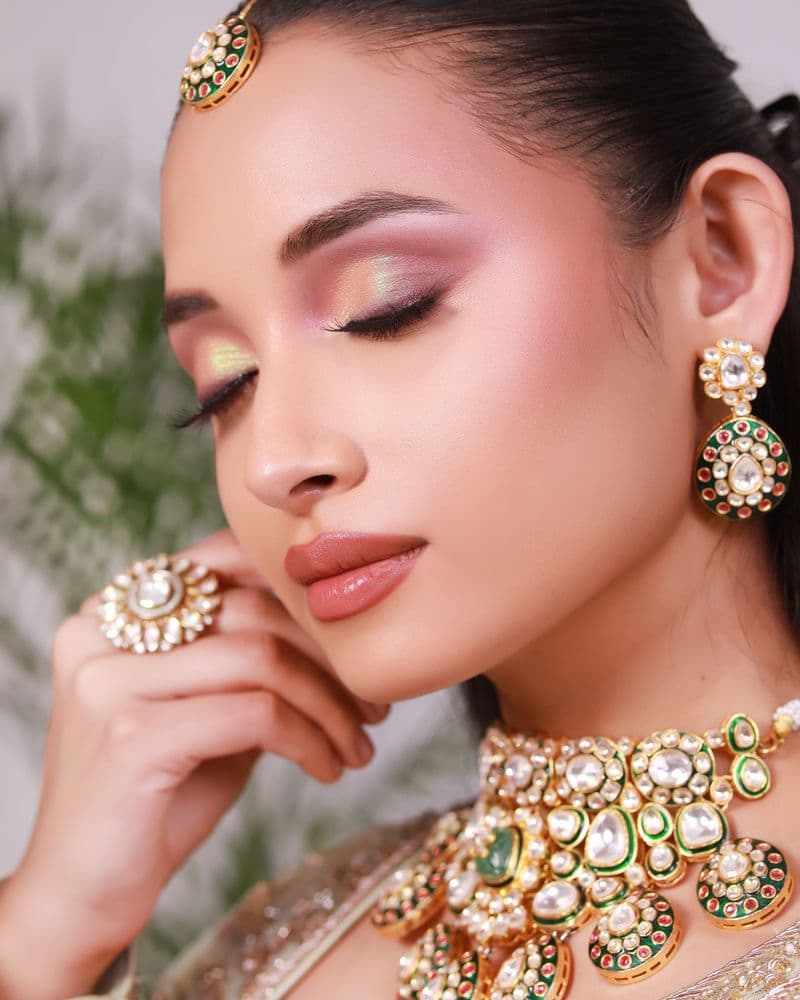 Elegant bridal look with traditional red attire, Ahilyanagar